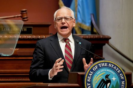 Minnesota Gov. Tim Walz addresses the state legislature.