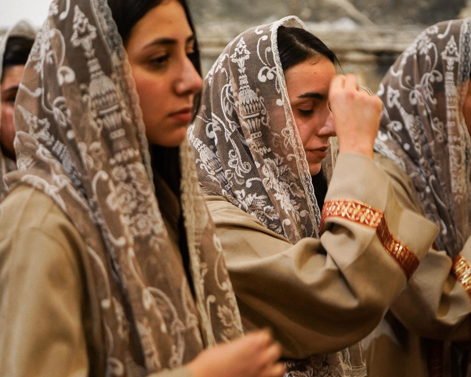 Christians pray during the consecration in Mosul.