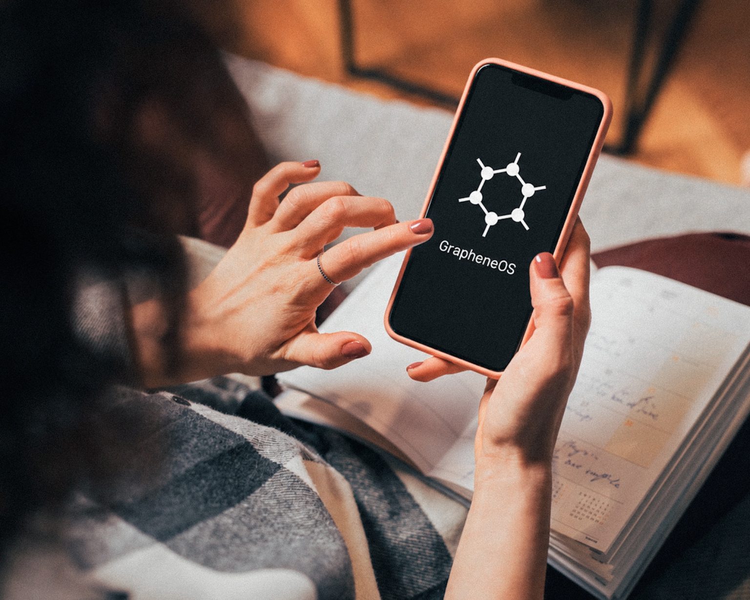 A smartphone with GrapheneOS.