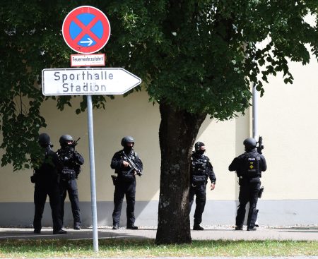 Armed police officers at Welfen High School.