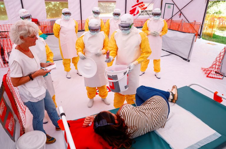 Healthcare workers in Congo fighting Ebola.
