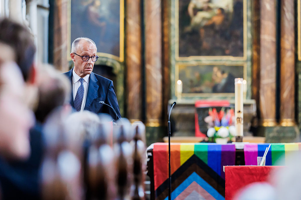 A rainbow flag draped across the altar at St Mary’s Church in Berlin reflects the increasingly progressive public posture of Germany’s established churches. Photo: Christoph Soeder/dpa/picture alliance via Getty Images