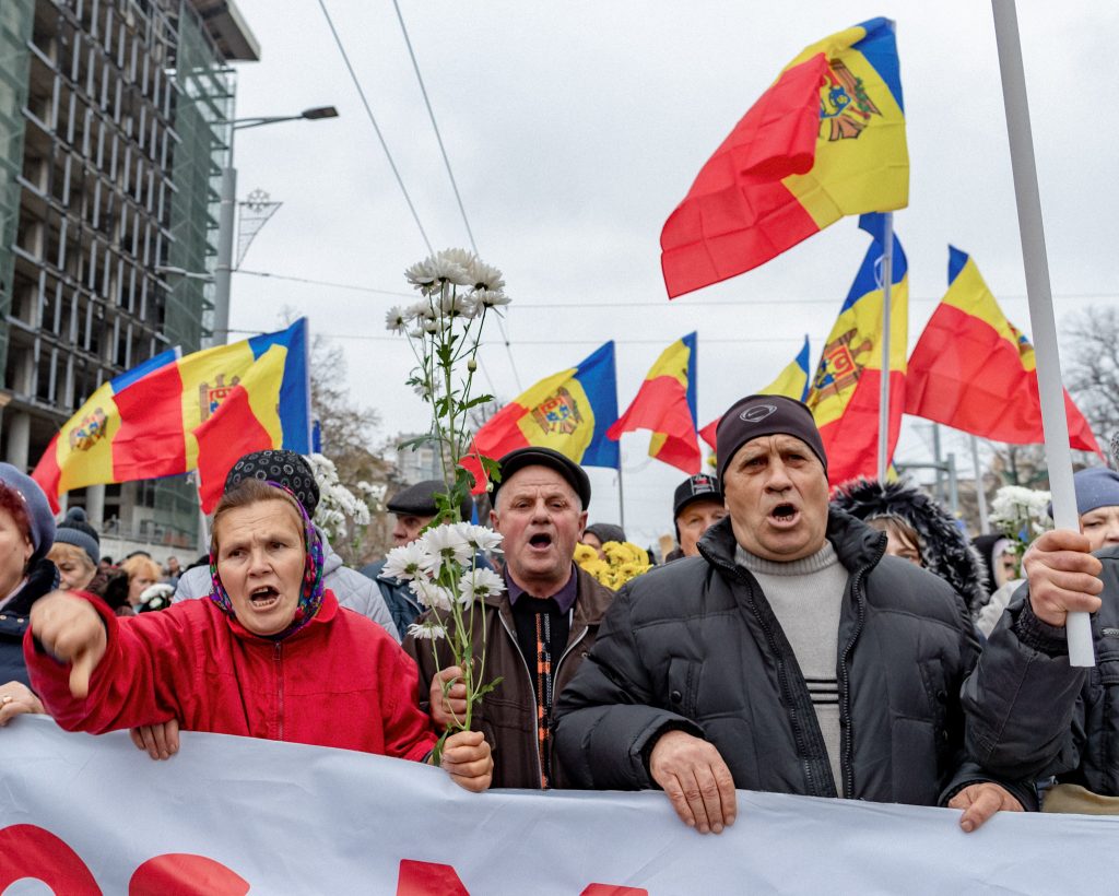 Several thousand protesters calling Moldova's pro-Western leaders to leave the high office march toward the Constitutional Court for the ninth consecutive Sunday, on November 13, 2022 in Chisinau, Moldova. President Maia Sandu argues that the protests are "a hybrid war" from Moscow. Photo: Vudi Xhymshiti/Anadolu Agency via Getty Images