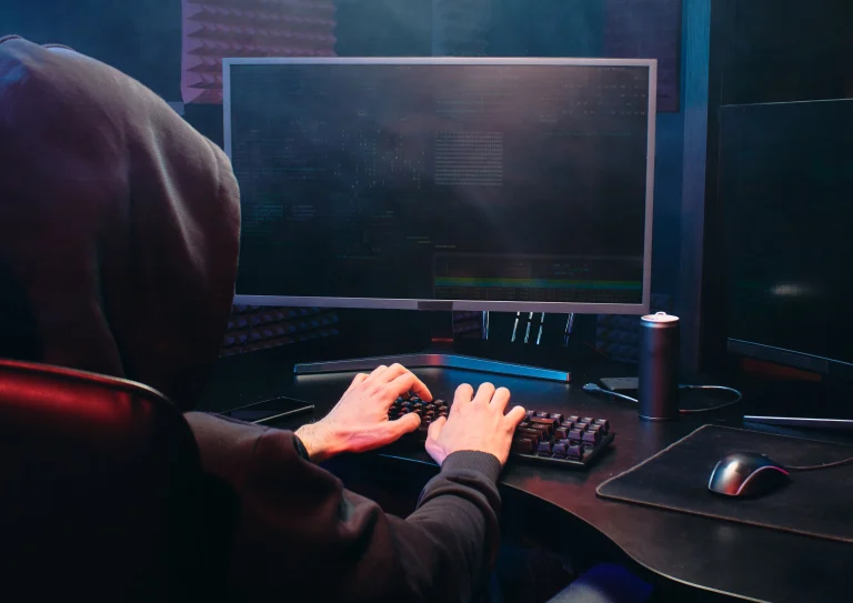 Person behind computer.