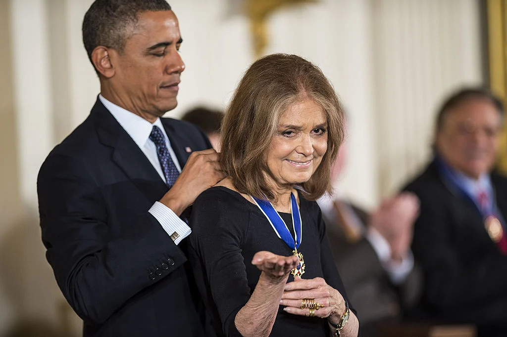 Gloria Steinem receives the Presidential Medal of Freedom from President Barack Obama at the White House on 20 November 2013. Photo: Leigh Vogel/WireImage