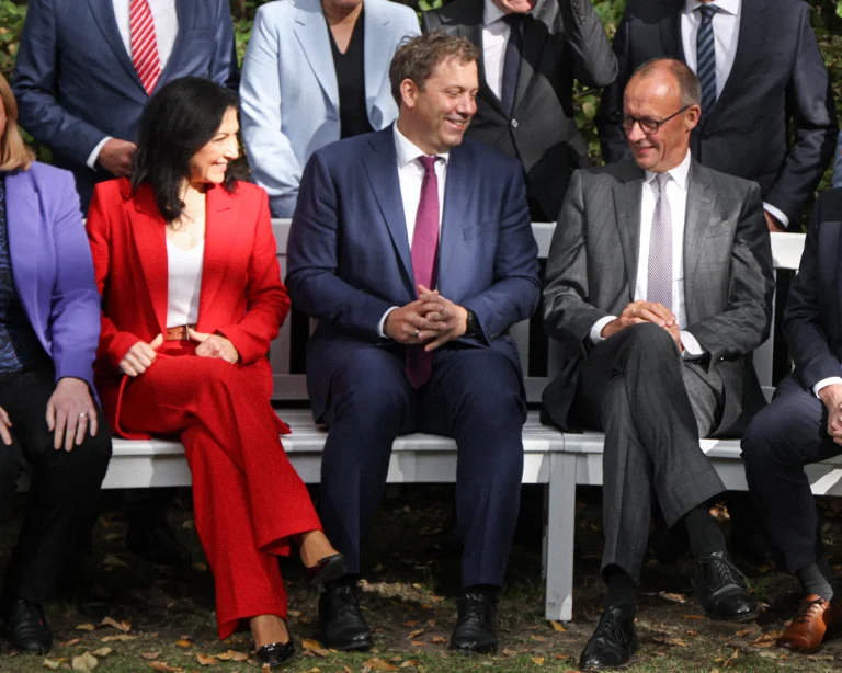 Friedrich Merz with Lars Klingbeil and Katherina Reiche.