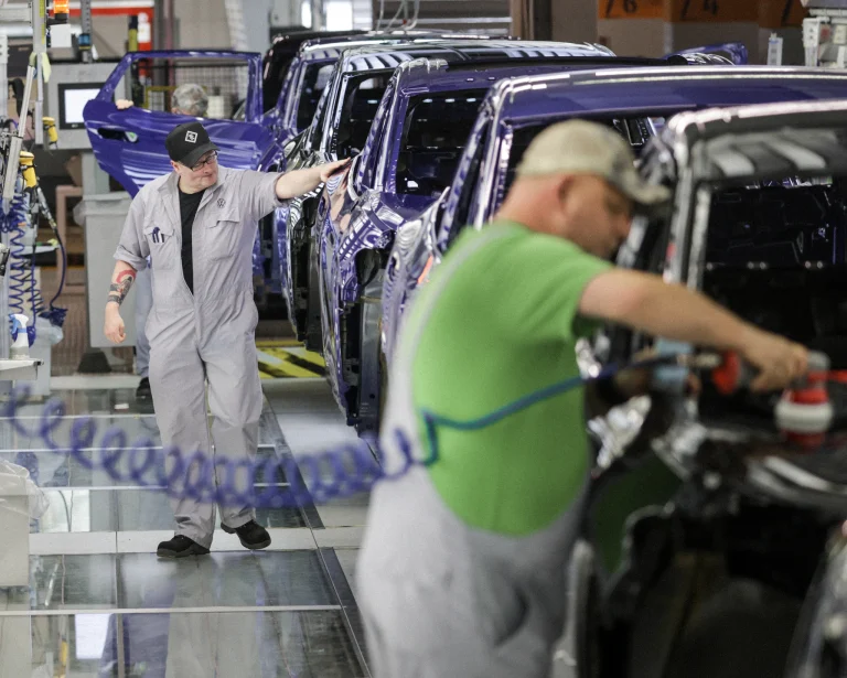 Volkswagen workers check ID electric cars in Emden.