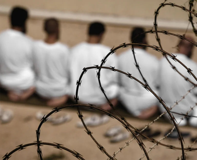 Prison staff and former inmates report pressure to convert to Islam.